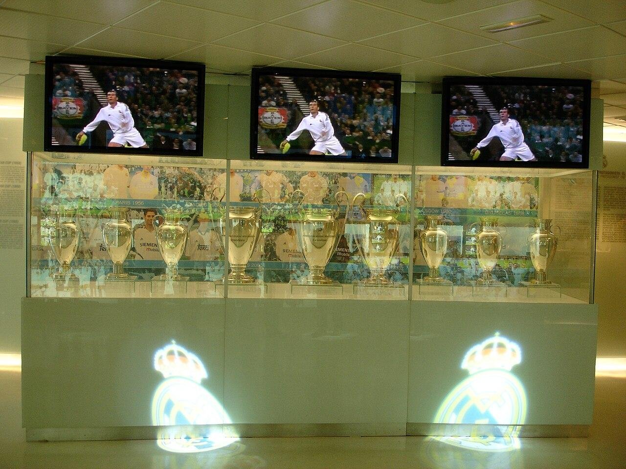 European Cup and Champions League trophies on display in a museum cabinet